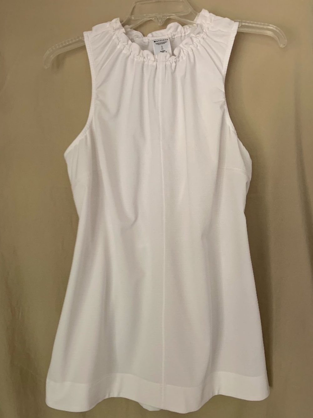 Athleta white 'Boundless Tank' with small ruffled neckline